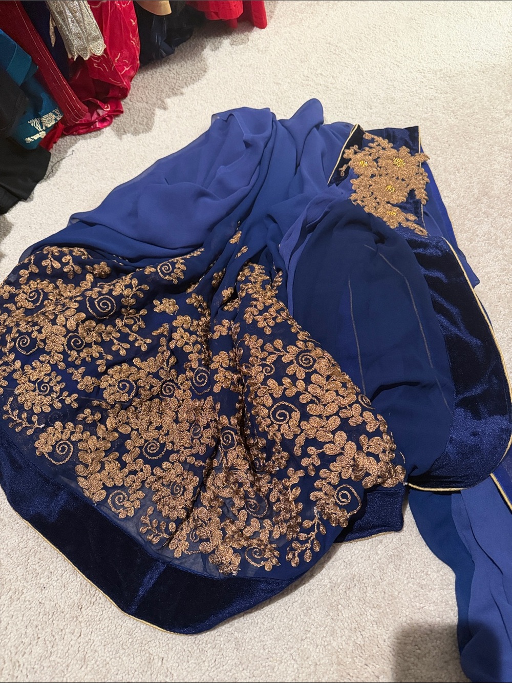 Deep navy and cooper embroidered pre pleated saree